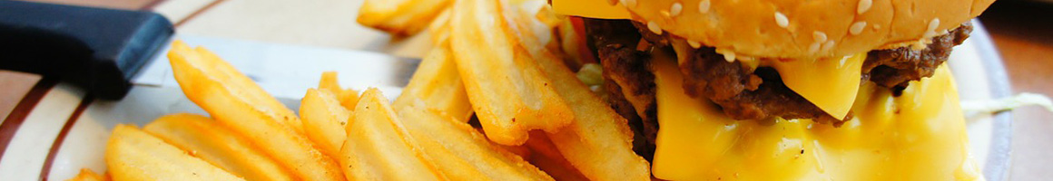 Eating Burger Pub Food at Wid's Place restaurant in Melbourne, FL.